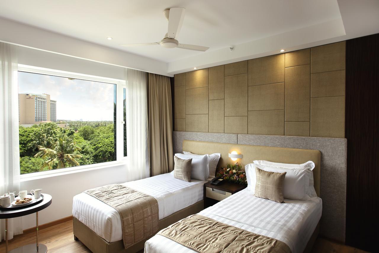 Sugar Business Hotel Kochi Luaran gambar
