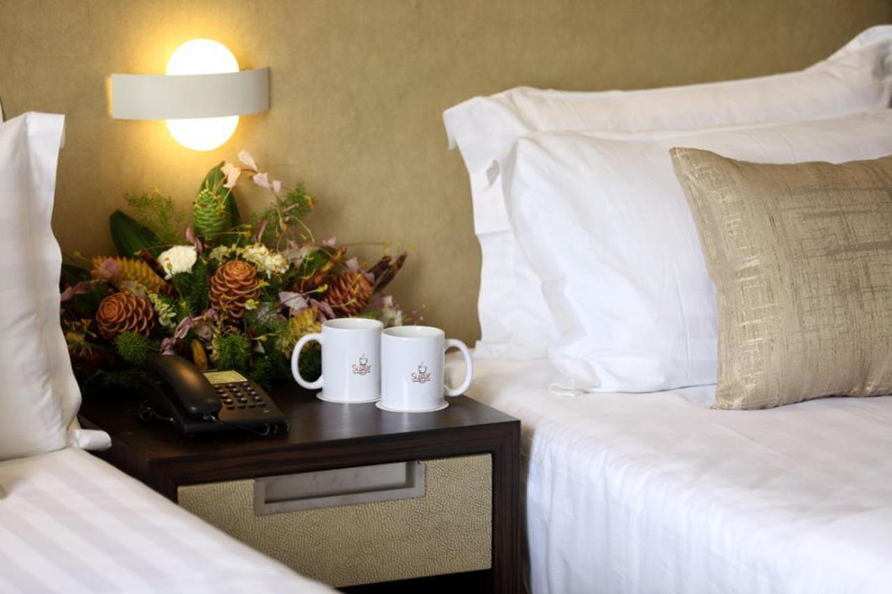 Sugar Business Hotel Kochi Luaran gambar